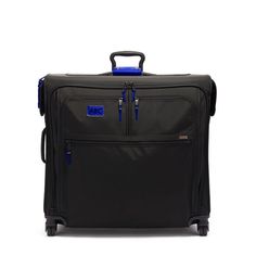 Our longer, full-feature wheeled garment bag brings complete convenience to traveling with suits, coats, and dresses. It's designed to hold up to six TUMI hangers and includes a shoe pocket that holds up to three pairs. A large exterior compartment allows for additional clothing. Part of our Alpha 3 Collection, iconic business and travel pieces that bring together innovative design, superior performance, and best in class functionality. Select styles come outfitted with a colorful TUMI Accents K Elegant Luggage For Overnight Trips, Elegant Luggage With Sleeve For Trip, Travel Products, Business Case, Garment Bag, And Dresses, Suits Coats, Garment Bags, Innovative Design