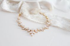 Add a touch of sparkle to your bridal look with this timelessly chic rose gold bridal bracelet! Handcrafted with marquise and round cut cz stones to create its lovely design. - Bracelet measures 6 inches and extends to 8.5 inches - Bracelet width measures 3/4 inch - Available in rose gold, rhodium, and yellow gold finishes - High quality Cubic Zirconia Matching jewelry: https://www.etsy.com/listing/687123210/rose-gold-bridal-necklace-and-earrings?ref=shop_home_active_19&frs=1&crt=1 Brows Elegant Marquise Bracelets For Wedding, Elegant Rose Gold Bracelets For Wedding, White Marquise Bracelets For Wedding, White Marquise Bracelet For Wedding, Rose Gold Wedding Jewelry, Gold Tennis Bracelet, Pearl Bracelet Wedding, Gold Bridal Necklace, Bracelet Rose Gold