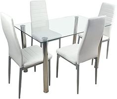 a glass table with white chairs around it