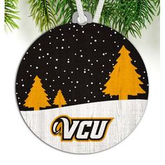 an ornament hanging from a christmas tree with the word vcu on it