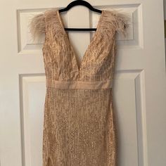 Brand New (No Tags) Long Rose Gold Gown. Beige/Light Pink Background, Overlay Gold Glitter. Feathers On Shoulders. Deep Slit On Leg. Rose Gold Gown, Background Overlay, Light Pink Background, Gold Gown, Beige Light, Long Gown, Pink Background, Deep V Neck, Accent Colors