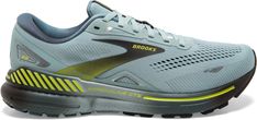 the brooks running shoe is shown in grey and yellow