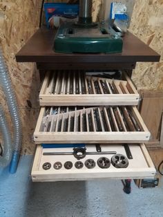 the drawers are organized and ready to be put into the wall by someone who is working on their workbench