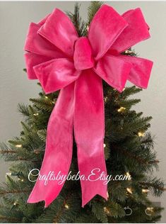 Pink Christmas Bow -,Hot Pink Christmas Wreath Bow - Handmade Designed on wired ribbon with this Gorgeous Pink Color Velvet Bow . Love it Tied with wire for easy attachment. Perfect for any Christmas Decoration on Pink Theme this Year. Great for a Christmas Tree as a Topper, Wreath Decor, Door Hanger, Lantern, Gift Wrap , Staircase , Fireplace, Garland.... And more. The Measurement for this Pink Velvet Bow Is : Approximately  14 inches wide  15 inches long tails  2.5 inches wide ( wired ribbon ) Visit my shop for more variety.... Enjoy Link: Craftsbybeba.Etsy.com  Hope you found what you were looking for.... Always welcome Looking forward to be part of your Christmas Decoration this Season.... Happy Holidays Orders Over $35 Free Shipping Hot Pink Ornaments, Pink Christmas Tree Topper, Tulle Christmas Decorations, Christmas Rustic Tree, Pink And Red Christmas Tree, Velvet Christmas Decor, Pink And Red Christmas Decor, Rustic Tree Ornaments, Wrap Staircase