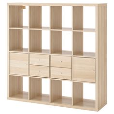 an open bookcase with six drawers and two doors on each side, in light wood