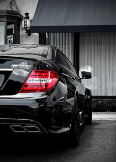 a car parked in front of a building