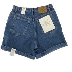 Nwt Vintage, Pre-Owned, Vintage Calvin Klein Med Wash Denim High Rise Shorts In Size 13/14. These Are Super Cute. Perfect For The Warm Weather! Last Two Pics See Two Little Spots Of Denim On The Fold Up Part. Super Hard To Notice. These Are Great Shorts! See All Pics And Measurements Below. Since They Are Vintage, Make Sure You Check Measurements To Assure They Will Fit. :-) Waist (Side To Side) - 16 Hips Approx - 21.5 Rise - 13 Inseam - 5 Top Of Short To Bottom (Measured On The Side) - 16 3/4 L Casual Mid-rise Jeans By Calvin Klein, Casual Mid-rise Calvin Klein Jeans, Casual Calvin Klein Mid-rise Jeans, Calvin Klein Casual Mid-rise Jeans, Calvin Klein High Waist Casual Bottoms, Spring Calvin Klein Mid-rise Bottoms, Trendy Calvin Klein Summer Bottoms, Casual Blue Calvin Klein Bottoms, Calvin Klein Casual Blue Bottoms