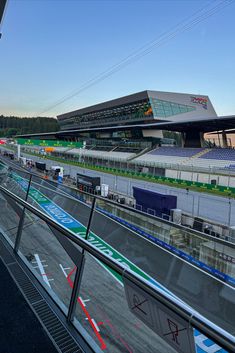 an empty race track with cars on it