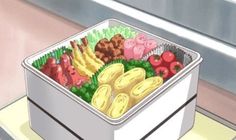 a container filled with lots of different types of food