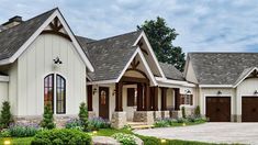 this is an artist's rendering of a house in the country style with two garages