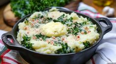 a pot filled with mashed potatoes and spinach