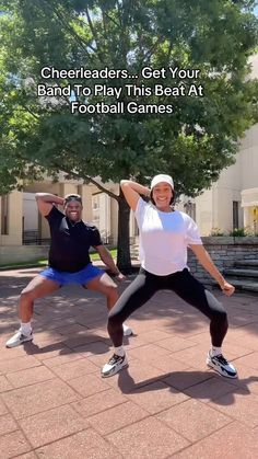 two people are doing exercises in front of a tree