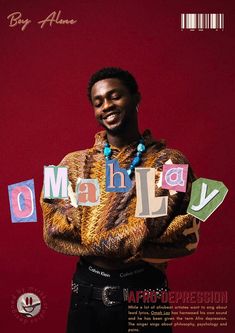 a man standing in front of a red wall with the words mahlay on it