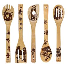 four wooden spoons and two forks with cartoon characters on them, all decorated in different designs