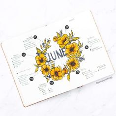 an open magazine with yellow flowers on it