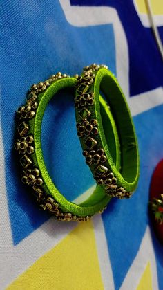 "Crafting elegance in light green silk thread bangles 💚✨ Handmade beauties for every occasion! DM to order. #LightGreenSilkThreadBangles #HandmadeJewelry" Diy Lace Ribbon Flowers, Bridal Braids, Silk Thread Jewelry, Silk Thread Bangles, Thread Bangles