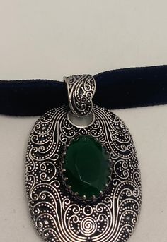 Very large ornate low content silver setting, Marker 925 but it is not. brilliant green emerald toned chrysoprase Over an inch long All jewelry is shipped in a nice gift box. Check out our over a THOUSAND great reviews Silver Emerald Necklace With Intricate Design, Green Oval Pendant Necklace With Engraving, Ornate Green Necklace For Formal Occasions, Green Engraved Necklace For Collectors, Green Oval Pendant Necklace Engraved, Vintage Oval Emerald Jewelry, Handmade Silver Emerald Necklace, Victorian Oval Green Necklace, Handmade Elegant Oval Emerald Necklace