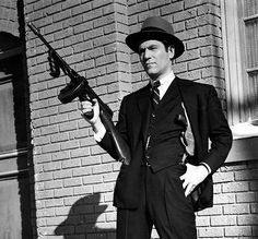 american gangsters of the 1920s & 30s | Lethal | actor with Tommy Gun. (Image | The Sun) 1920s Gangsters, Sonny Corleone, Public Enemies, Real Gangster, Gangster Style, Mafia Gangster, Al Capone, Roaring 20's, Traditional Tattoos