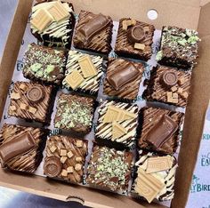 a box filled with lots of different types of chocolates