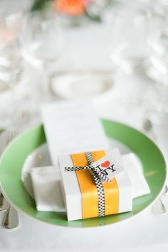 a table set with place settings and napkins