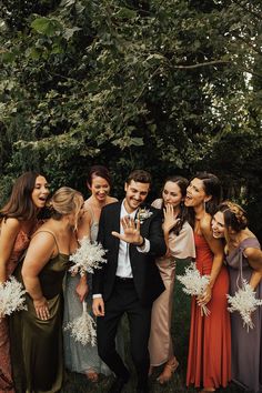 All the Bridesmaids Standing around the groom admiring his Wedding ring Wedding Photography Poses Bridal Party, Wedding Group Photos, Bridal Party Photography, Wedding Party Poses, Bridesmaid Poses, Bridal Party Poses