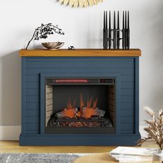 a living room with a fire place in the center and a clock on the wall