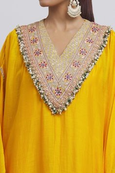 Yellow kaftan with floral embroidered yoke, with beaded tassels and lace embellishments. Comes with plain inner slip. - Aza Fashions Yellow Kaftan, V Neck Kaftan, Lace Embellishments, Anamika Khanna, Silk Kaftan, Beaded Tassels, Embroidered Silk, Yellow Floral, Aza Fashion