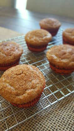 several muffins cooling on a wire rack