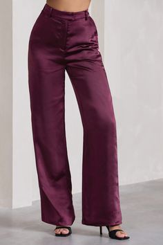 No Limits are the wide-leg trousers to make you stand out no matter the setting. Designed in luxurious weighted satin. these burgundy trousers boast a high-rising waistband with loops to slip in a belt and accentuate your curves further. Create the perfect tailored ensemble by pairing No Limits with an oversized shirt.Features- Premium heavy satin- High rise- Side slip pockets- Invisible hook closure- Belt loops- Wide legsSizing & FitModel is 5'7 and wears UK size 8 / US size 4Product InformationDesigned exclusively by Club L LondonUnlined with no stretchPremium satin in Burgundy (100% Polyester)Lining: (97% Polyester. 3% Elastane)83.5cm inside leg lengthSKU: CL129505069 Satin Wide Leg Pants For Workwear, Chic Satin Wide Leg Pants In Solid Color, Full Length Wide Leg Satin Pants For Work, Full Length Satin Wide Leg Pants For Work, Formal Satin High-waisted Wide Leg Pants, Elegant Satin Pants For Fall, Elegant Purple Satin Bottoms, Burgundy Wide Leg Pants For Party, Chic Burgundy Pants For Party