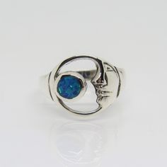 Vintage Sterling Silver Blue Opal Moon Ring....Marked 925...Total of weights 2.2grams... Size 8....Measure of face 12.7MM...It's in very good condition. Symbolic Blue Round Rings, Opal Band Ring, December Birthstone Ring, Opal Band, Emerald Earrings Studs, Hammered Band, Turquoise Ring Silver, Moon Ring, Silver Moon