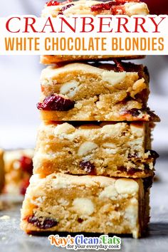 cranberry white chocolate blondies stacked on top of each other with text overlay