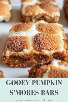 gooey pumpkin s'mores bars on a white plate with text overlay