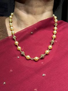 22 karat gold necklace with culture pearls 
     - 235-GN2220 - in 31.200 Grams for USD $1,964.21 USD. 
Made in India by Totaram Jewelers Online this product is in Gold - 22 Karat BIS Hallmark 916 Gold  & is an excellent gift for Adult - Women. Ships fully insured with secured guaranteed delivery for free with your order over $250 from New Jersey USA & comes with 30 days exchange policy. 22k Gold Pearl Necklace For Celebrations And Festivals, Traditional Gold Pearl Drop Necklace, Traditional Gold Pearl Necklace For Formal Occasions, Gold Plated Temple Jewelry Pearl Necklace For Celebration, Gold Plated Pearl Necklace For Celebrations, Temple Jewelry Style, Gold 22k Pearl Necklace For Wedding, Gold Pearl Drop Necklace For Festivals, Traditional Gold Pearl Necklace, Festive Gold Pearl Necklace With Pearl Pendant