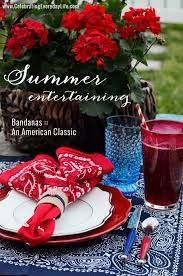 the cover of an american classic cookbook shows red flowers and napkins on a table