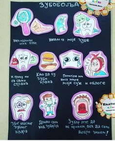 a blackboard with stickers on it showing different types of teeth and mouth shapes