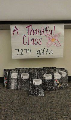 a sign that says a thanksgiving class with flowers on it and five gift bags under it