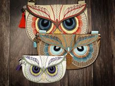 two purses with an owl design on them