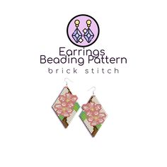 a pair of earrings with pink and green designs on them, sitting in front of a white background