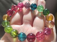 Material:  tourmaline beads The color is darker indoors or in dark light, and more colorful under sunlight. Tourmaline loves light. size :  Approx 10.5mm quantity: one strands 6mm approx 29 pcs one strands 7mm approx25 pcs one strands 8mm approx 22 pcs one strands 9mm approx 21pcs one strands 10mm approx 19 pcs one strands 11mm approx 18pcs one strands 12mm approx 16 pcs one strands 13mm approx 16 pcs one strands 14mm approx 15 pcs one strands 15mm approx 14pcs one strands 16mm approx 14 pcs one Spiritual Multicolor Tourmaline Beaded Bracelets, Hand-strung Multicolor Beads Gems And Cabochons For Gifts, Polished Round Carnelian Beads, Gems, And Cabochons, Multicolor Glass Multi-strand Beads, Red Multi-strand Gemstone Beads, Multicolor Multi-stone Beads Gems And Cabochons For Gifts, Tourmaline Bracelet, Tourmaline Beads, Nature Bracelets