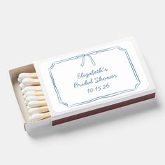 matches in a box with the label for an elegant bridal shower on it's front