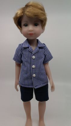 "Our 12\" doll, Rory, is all dressed up in his collared boy style shirt.  These handmade cotton shirts are made from an upcycled material.  Each shirt has a hook and loop front closure located behind a faux button placket. Note: The African shirts are made from an upcycled African batik shirt; each shirt is a bit different. The collared boy faux button up shirt fits 12\" Ruby Red Siblies Dolls and is ready to ship! Your order will ship within 1 business day.  Please contact me with any questions Short Sleeve Shirt With Button Closure For Playtime, Cute Collared Shirt For Playtime, Collared Shirt With Button Closure For Playtime, African Shirts, Batik Shirt, Cotton Shirts, Shirt Fits, Doll Clothing, Style Shirt