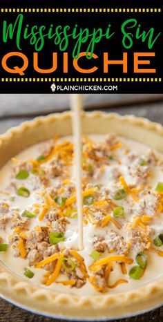 a pie with cheese, meat and green peppers on it is being cut into slices