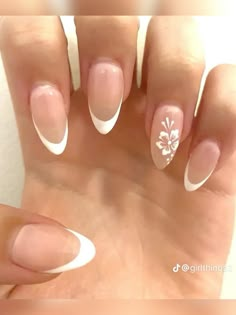 Flower On One Nail Design, Almond Nail With Flower Design, Clear Nail Base Designs, White French Tips With Flowers On Ring Finger, Nails White Design Classy, White Almond Nails With Flower Design, Recent Nail Trends, Summer Nails White Flowers, Almond French Tip Summer Nails