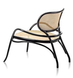 a black chair with woven seat and back