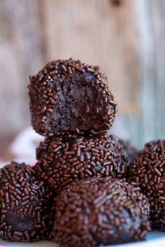 chocolate donuts stacked on top of each other