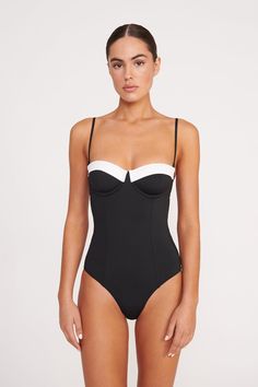 The Maeve One Piece is the newest one piece in our Dolce swim collection. This style features contrast trim at the bust and has molded cups for a sexy fit. This style also has removable spaghetti straps so you can wear the one piece as a strapless swimsuit. Modern Bathing Suits, White And Black Swimsuit, Vintage Beachwear, Strapless One Piece, Black And White One Piece, Preppy Fits, Vacation Fashion, One Piece Black, Strapless Swimsuit