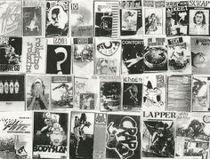 the wall is covered with posters and other things that are on display in black and white