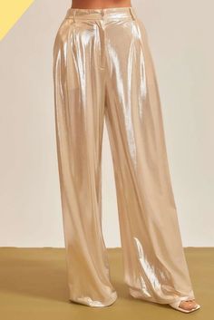 Silky satin pants are cut with neat pleats and handy pockets for a look that's easy to style up or down. • Front Zipper/Buttons• Pleated Details• Side Pockets• Belt Loops• Wide Leg Metallic Trousers, Vinyl Leggings, Metallic Pants, Shiny Pants, Fashion Design Collection, Satin Trousers, Satin Pants, Metallic Dress, Gold Dress