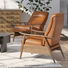 two chairs and a coffee table in a living room with white rugs on the floor