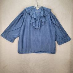 ✨ Unleash your style with our vintage silk blouses – because fashion should be an adventure, not a routine! 🚀 Treat yourself to timeless elegance with Threaded Sugar on eBay. 🌟 Swipe to stun, click for chic, and follow for glam! ✨💫 Links in bio!🌺 For 25% OFF use code: LUV25OFF Take advantage of our Shipping Discount. Ship up to 5 items for $10.00! #SilkSerenity #MaximalistChic #vintageclothing #y2k #vintagestyle #vintagefashion #secondhand #thriftedfashion #90s #80s #eBaySeller #eBay Blue Ruffle Sleeve Tops For Fall, Casual Blue Top With Ruffled Collar, Casual Blue Tops With Ruffled Collar, Blue Blouse With Ruffled Collar And Details, Blue Blouse With Ruffled Collar For Daywear, Casual Blue Blouse With Ruffled Collar, Blue Ruffled Tops For Fall, Blue Ruffled Blouse For Spring, Blue Ruffled Collar Blouse For Fall